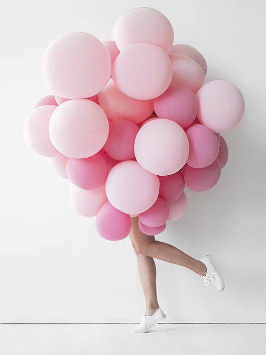 bunch of happy, millennial pink balloons