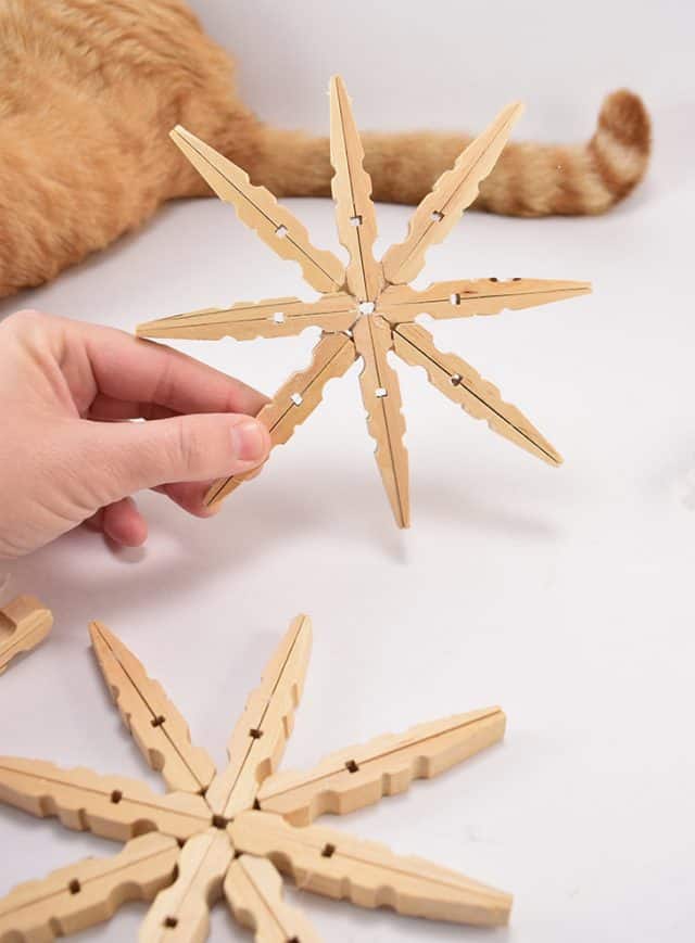 DIY Glitter Clothespin Snowflakes Craft